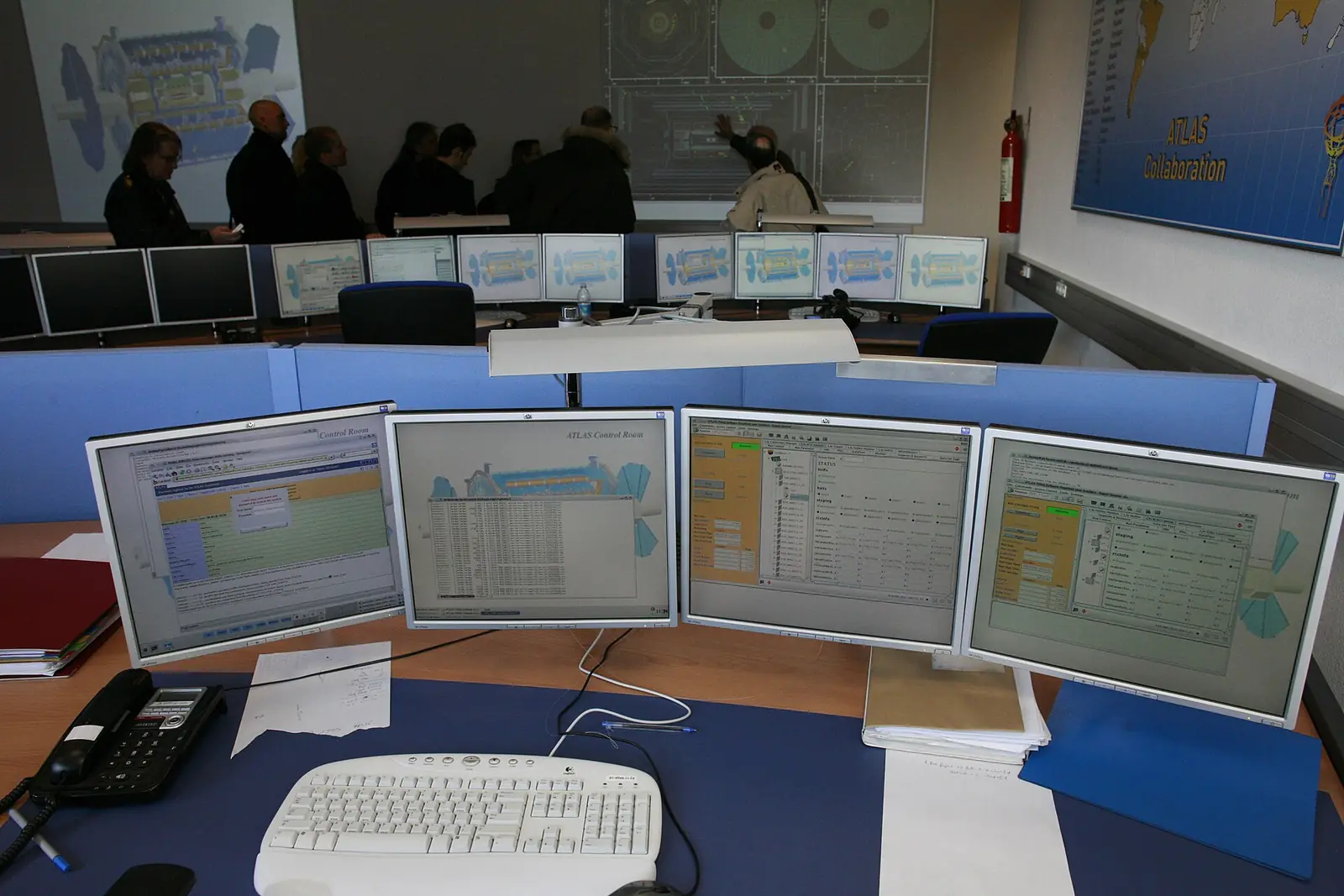 Computer monitors in a control room at CERN, 2008.