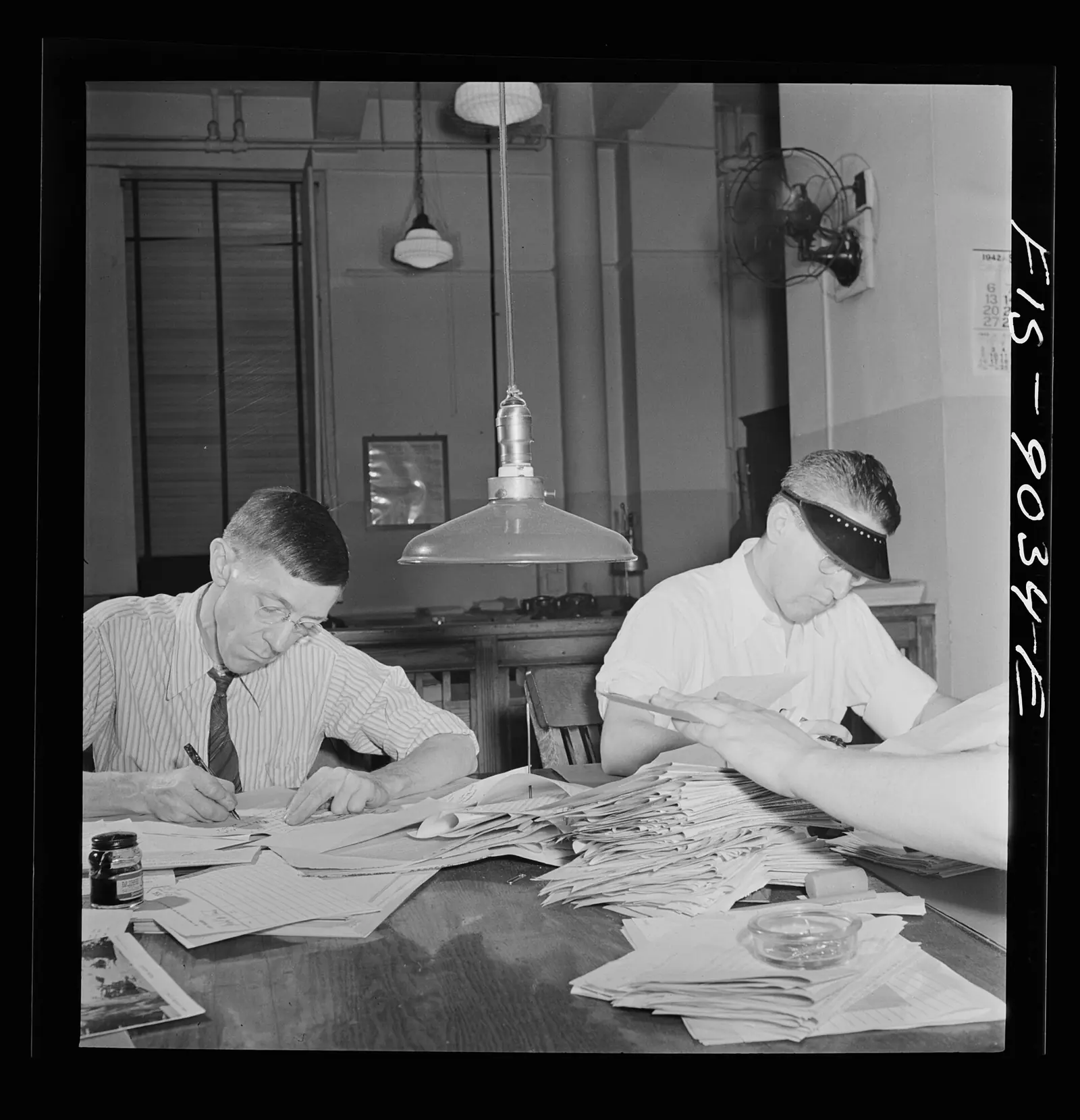 Copy readers at the foreign desk of The New York Times newsroom, New York, September 1942.